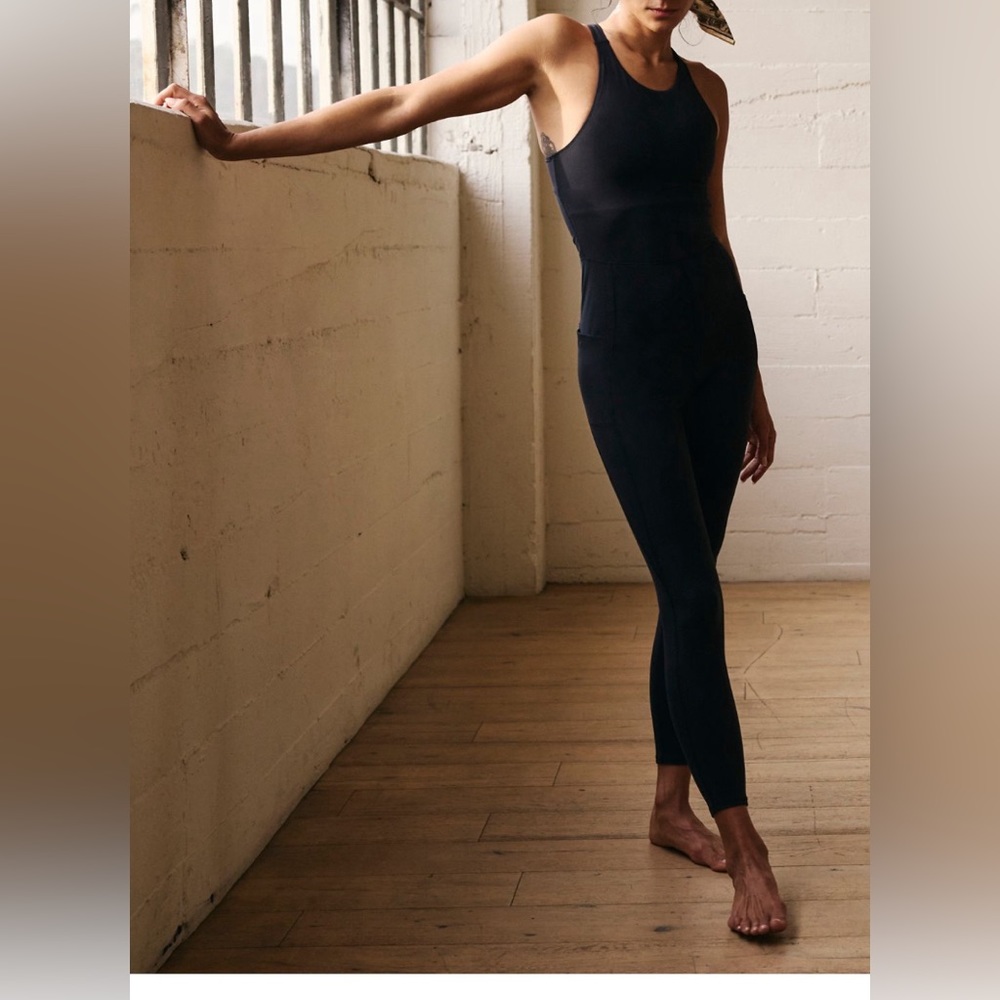 FP Movement by Free people, Never better High Neck one piece jumpsuit NWT!